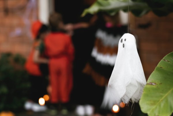 Out of focus Christmas scene including a 'white sheet' ghost